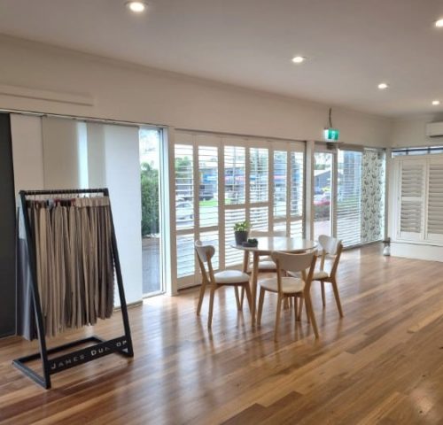 Lobby or Lounge Area Featuring Shutters Rollers Curtains — Winning Blinds in Cardiff, NSW
