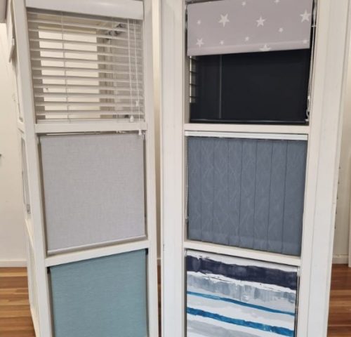 Back Of Showroom Rollers For Client — Winning Blinds in Cardiff, NSW